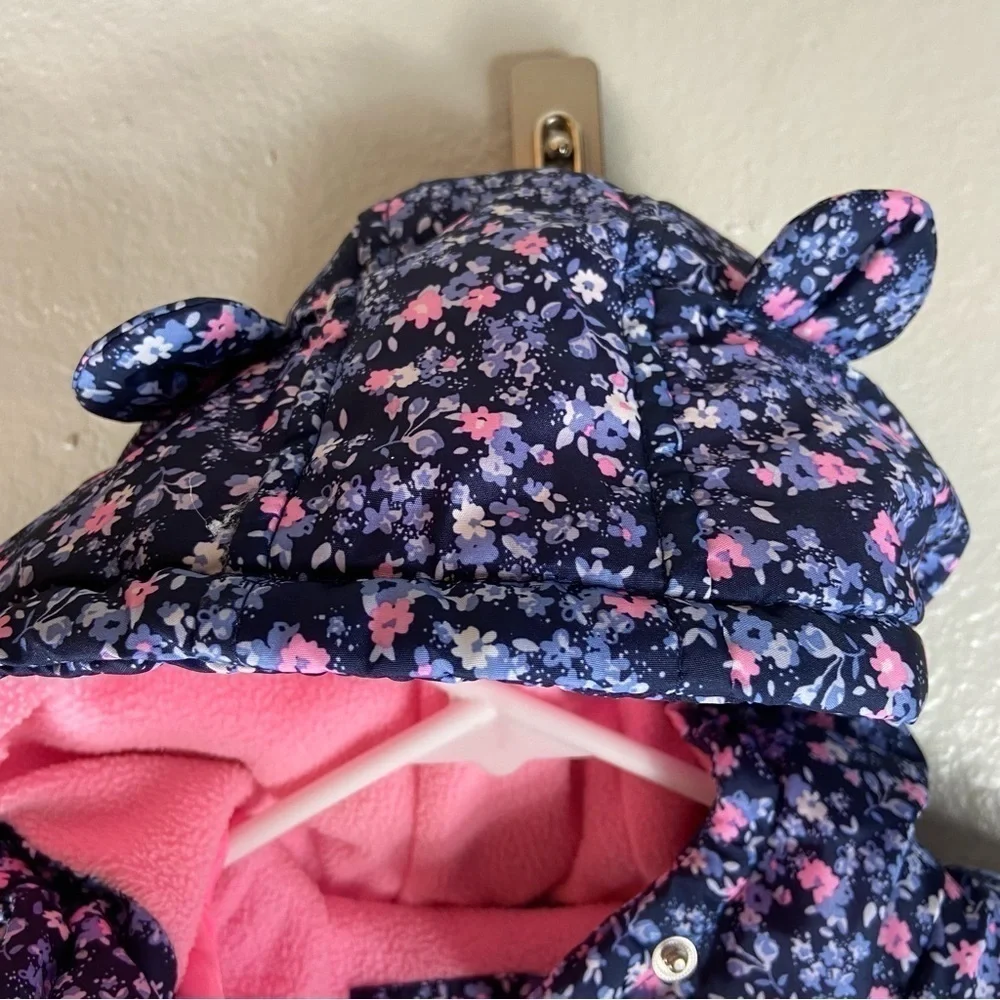 Carters Child’s Puffer Coat with Blue Floral Print. Size 18 months.